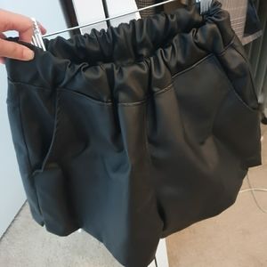 Black leather shorts
